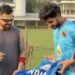 Virat Kohli Signs Autograph on Net Bowler’s India Jersey